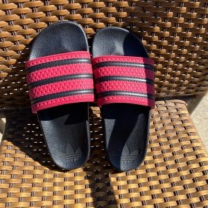 Red and black Adidas slides. Hardly worn.